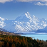 38773AM00: Aoraki / Mount Cook (3754m) and Lake Pukaki in winter. Mt La Perouse (3078m) left, Tasman Valley and Burnett Mountains Range right. Panorama with late autumn colours, Aoraki / Mount Cook National Park, MacKenzie District, New Zealand. Photocredit to be given as Rob Suisted / www.naturespic.co.nz.